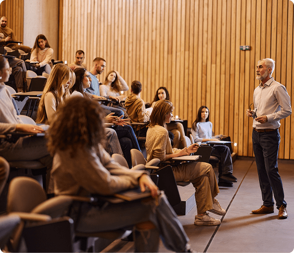 Professor lecturing students in a classroom